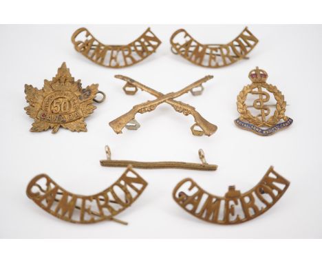 A small quantity of Great War British and Dominion army insignia including a Wounded Strip and a Canadian 50th Overseas Batta