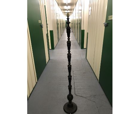A vintage oriental style bronzed brass standard lamp