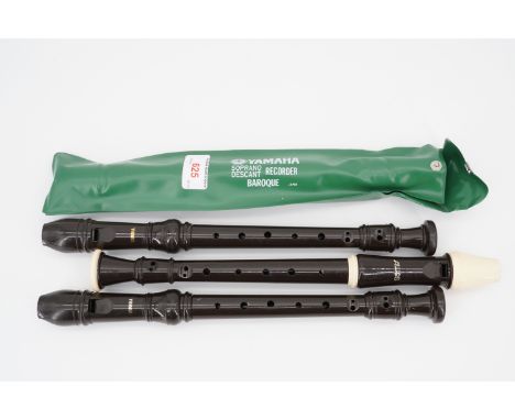 A Yamaha recorder and two others