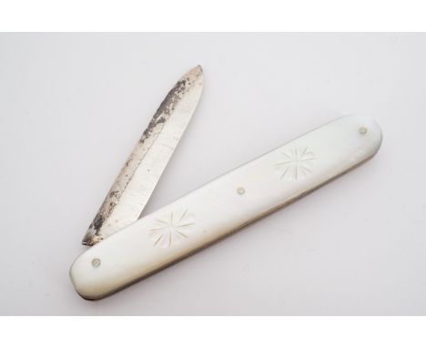 A Victorian silver folding knife with carved ivory grip scales, Sheffield, 1897