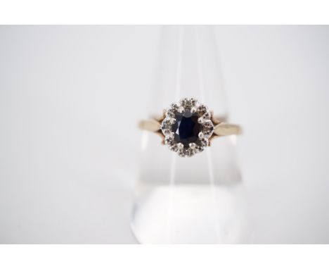 A vintage 9ct gold sapphire and diamond flower head cluster dress ring, size N, 2.9g 