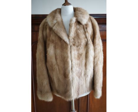 A vintage fur swing jacket, with Peter Pan collar and bracelet length sleeves, 22" across the back