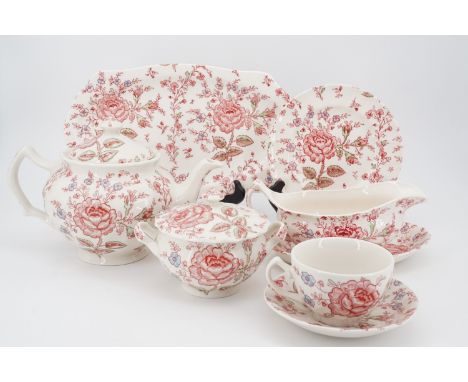 A Johnson Brothers tea and dinner service, transfer printed and hand-tinted with roses