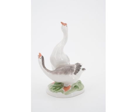 A Russian Lomonosov porcelain figurine modelled as two geese