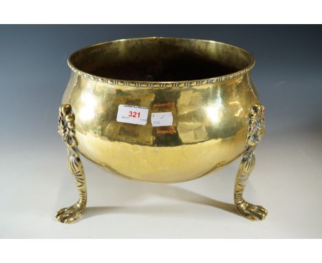 A brass planter, 23 cm high