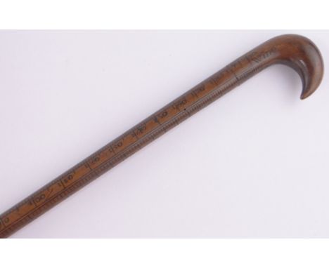 A Victorian stained wood Vintners measuring stick.