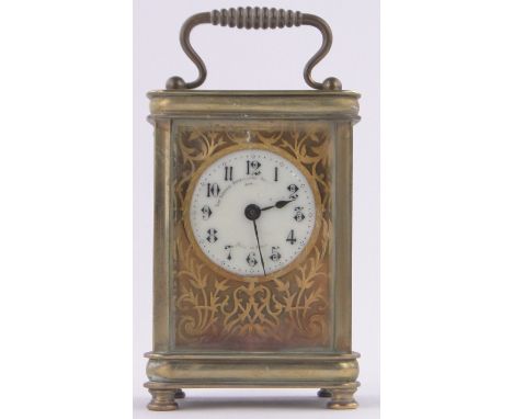 A French gilt brass cased carriage clock, dial marked The London Jewellers & Silversmith's Co., Jersey, made in Paris, the ce