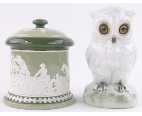 A Carltonware pottery tobacco jar with relief hunting scene, and a porcelain owl design night light, height 16.5cm, (2).