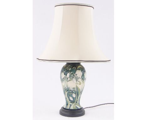 A modern Moorcroft Pottery snowdrop design table lamp, base height excluding fitting 30cm.