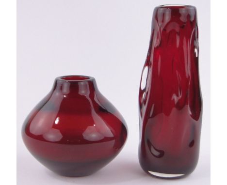 Geoffrey Baxter for Whitefriars, a ruby glass squat vase, height 13.5cm and a ruby glass knobbly vase, height 23.5cm, (2).