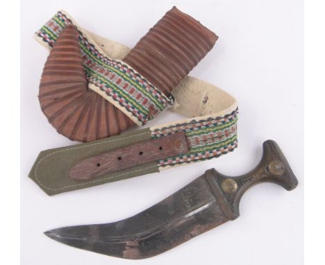 A Middle Eastern curved dagger, 18th/19th century, rhino horn handle with inlaid decoration, blade length 21cm, original leat