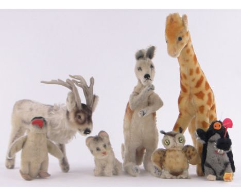 A group of Vintage Steiff toys, including Renny Reindeer, male Kangaroo, Giraffe, Maxi Mole, Peggy Penguin, Cat and Owl, (7).