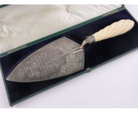 A Victorian silver presentation trowel, spiral carved ivory handle and inscription relating to laying a foundation stone of t