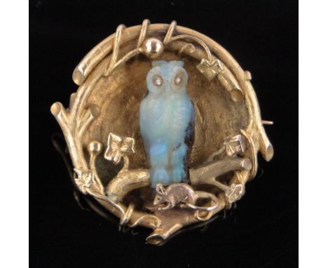 An unusual 19th century unmarked gold opal and diamond brooch in the form of an owl on a branch,with a small mouse below, no 