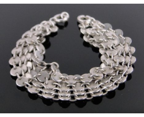 An Hermes silver bracelet.