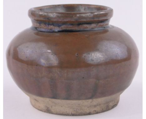 An Oriental Tenmoku glaze ceramic pot, diameter 11cm, height 8cm.
