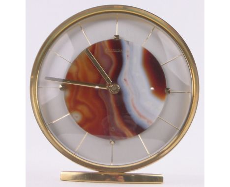 A Jaeger Le Coultre gilt metal cased retro 8-day mantel clock, polished agate dial in silvered surround, height 13.5cm.