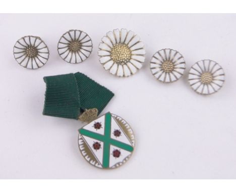 A group of silver and enamel daisy head pattern jewellery.
