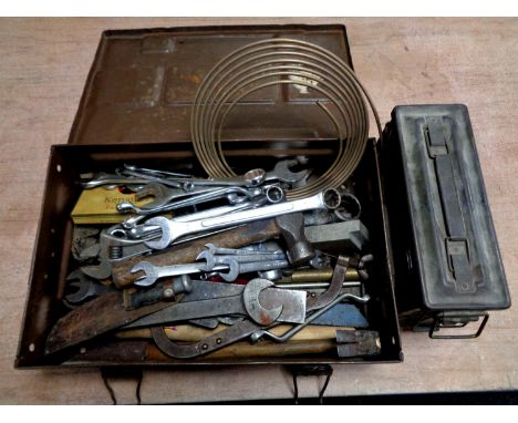 A World War II ammo crate containing a large quantity of tools, knife in sheath etc, together with one further ammo tin  