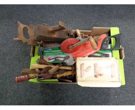 A box containing a quantity of hand tools, drills, woodworking plane etc  