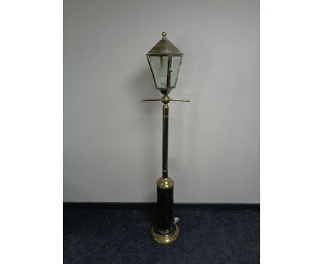 A contemporary brass standard lamp in the form of a street light, height 171cm. 
