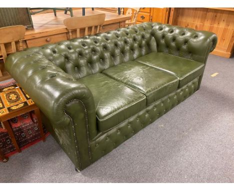 A green button leather Chesterfield three seater settee 