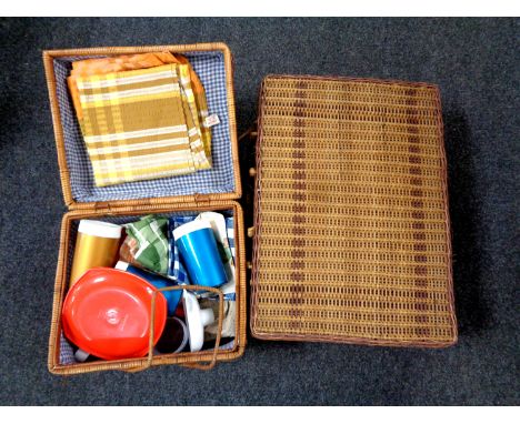 A wicker picnic hamper and contents together with one other empty hamper 