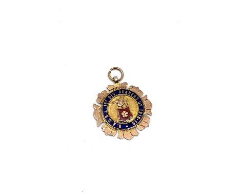 A 9ct gold and enamel medal, B.A.D.B.L 1st Div. Runners Up 1918-19.  CONDITION REPORT: 8.5 grams