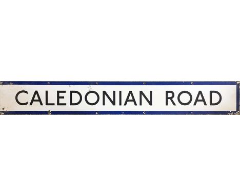 London Underground enamel PLATFORM FRIEZE PANEL from Caledonian Road station on the Piccadilly Line. Measures 64.5" x 9" (164