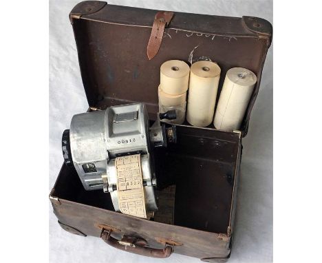 London Transport GIBSON TICKET MACHINE with original box and spare ticket rolls. Machine no 21500, prints money values from 1