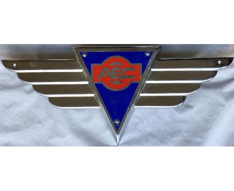 An AEC winged COACH BADGE as fitted to the front panel of AEC coaches, such as the Reliance, 1950s-70s. A complete unit, stai