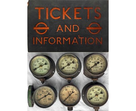 London Underground items comprising a perspex SIGN 'Tickets and Information' with two bullseye logos, designed to be backlit 