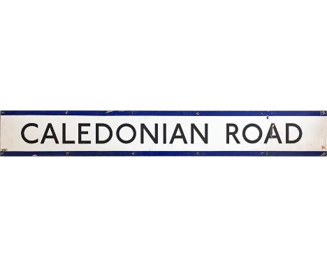 London Underground enamel PLATFORM FRIEZE PANEL from Caledonian Road station on the Piccadilly Line. Measures 64.5" x 9" (164
