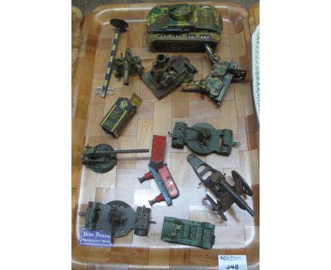 German vintage tinplate tank together with other tinplate items including: machine gun; cannon; Britains diecast cannon; mili