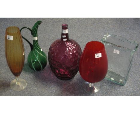 Group of assorted mixed glass to include: ruby glass brandy balloon; green glass spiral ewer; amber glass pedestal vase; pink