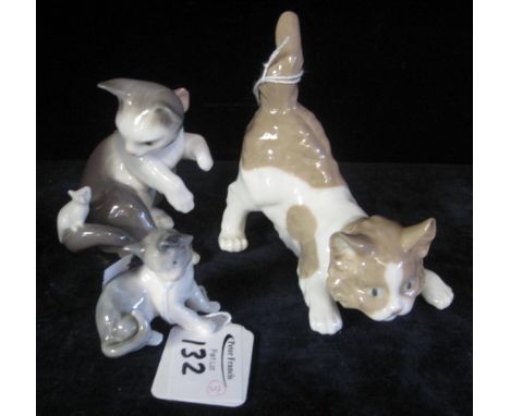 Three similar Lladro Spanish cat studies. (3)(B.P. 24% incl. VAT)