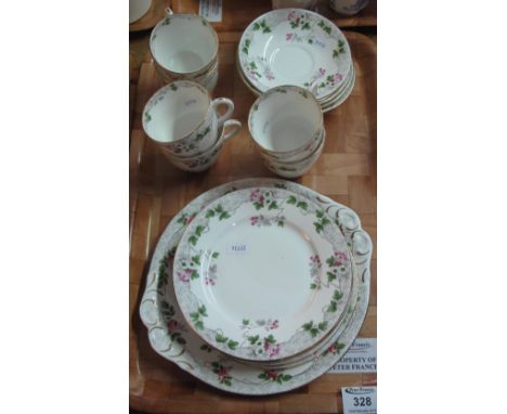 Eighteen piece Shelley china tea service on a white ground with blossom and berry decoration.(B.P. 24% incl. VAT)