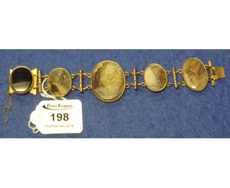 Victorian agate specimen bracelet.(B.P. 24% incl. VAT)   CONDITION REPORT:  Small crack to centre stone, one other has a hair