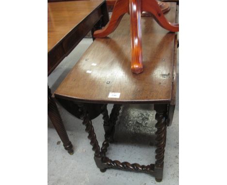 Late 19th/early 20th Century oak barley twist gate legged table.(B.P. 24% incl. VAT)
