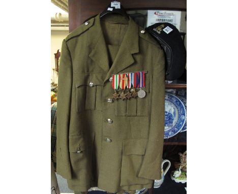 British Army Officers uniform, tunic and trousers, together with a group of Second World War medals, including The Africa Sta