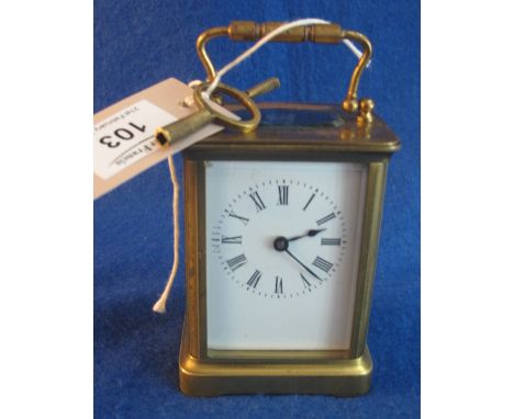 French brass carriage clock with full depth enamel Roman face, with key.(B.P. 24% incl. VAT)