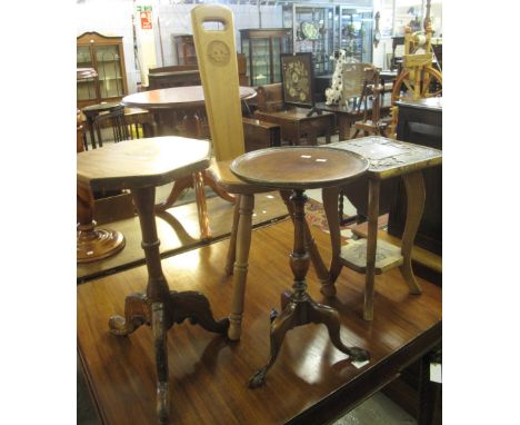 Group of furniture to include: a beech spinning chair; carved floral two tier jardiniere stand and two tripod wine stands. (4