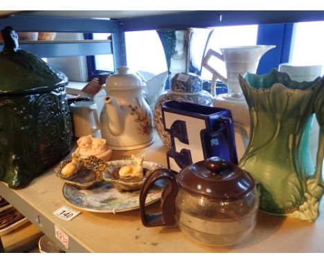 Shelf of mixed ceramics 