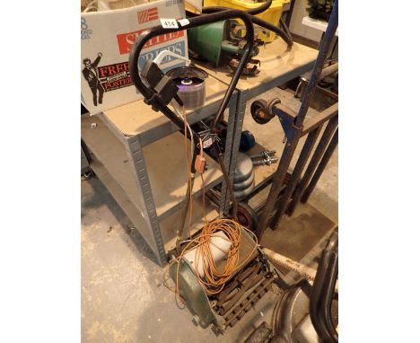 Early electric rotary cut lawn mower 