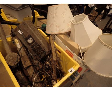 Home battery charger unit hand tools mallets and box with table lamps and a small shelf unit
