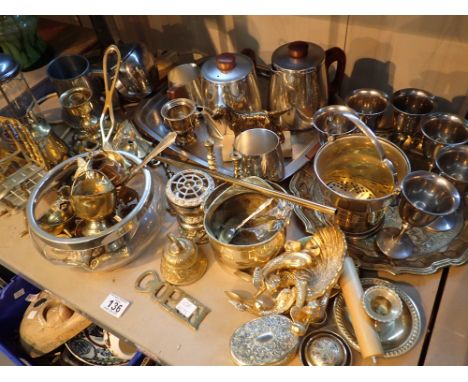 Shelf of mixed metalware