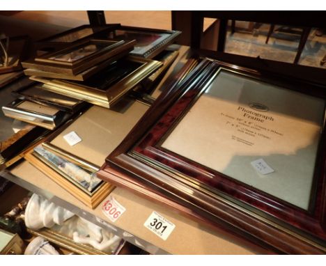 Shelf of mixed photo frames