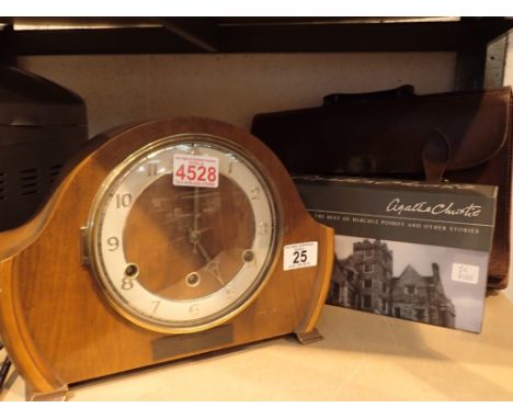 Pendragon leather briefcase with Agatha Christie DVD box sets and a Westminster chime mantel clock