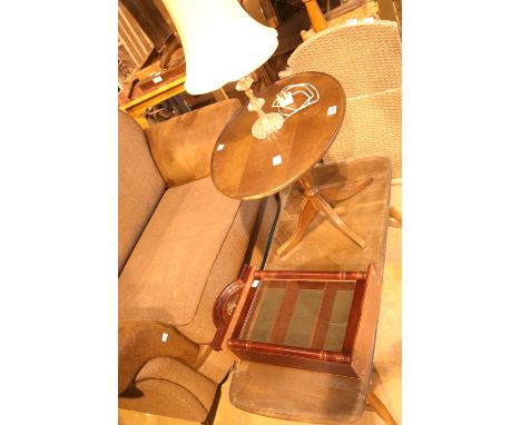 Glass topped wooden coffee table, 105 x 46, a mahogany oval side table, wall hanging display cabinet and a table lamp. Not av