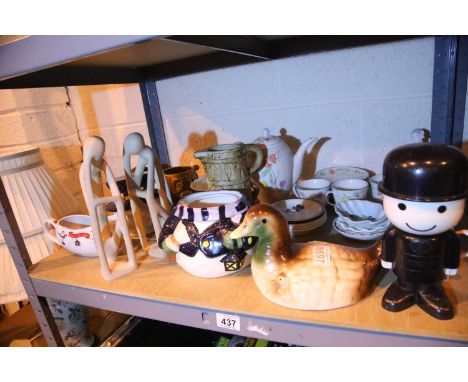 Shelf of mixed ceramics including large figurines, teapot, Homepride man etc. Not available for in-house P&amp;P 